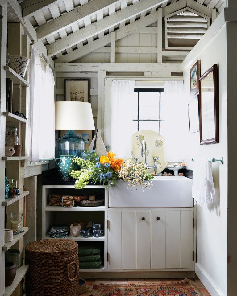 pool house sink filling with flowers