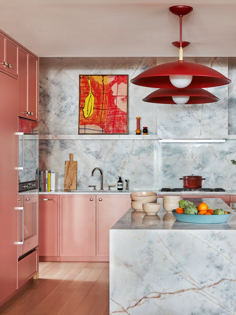 Kitchen with marble and pink cabinets