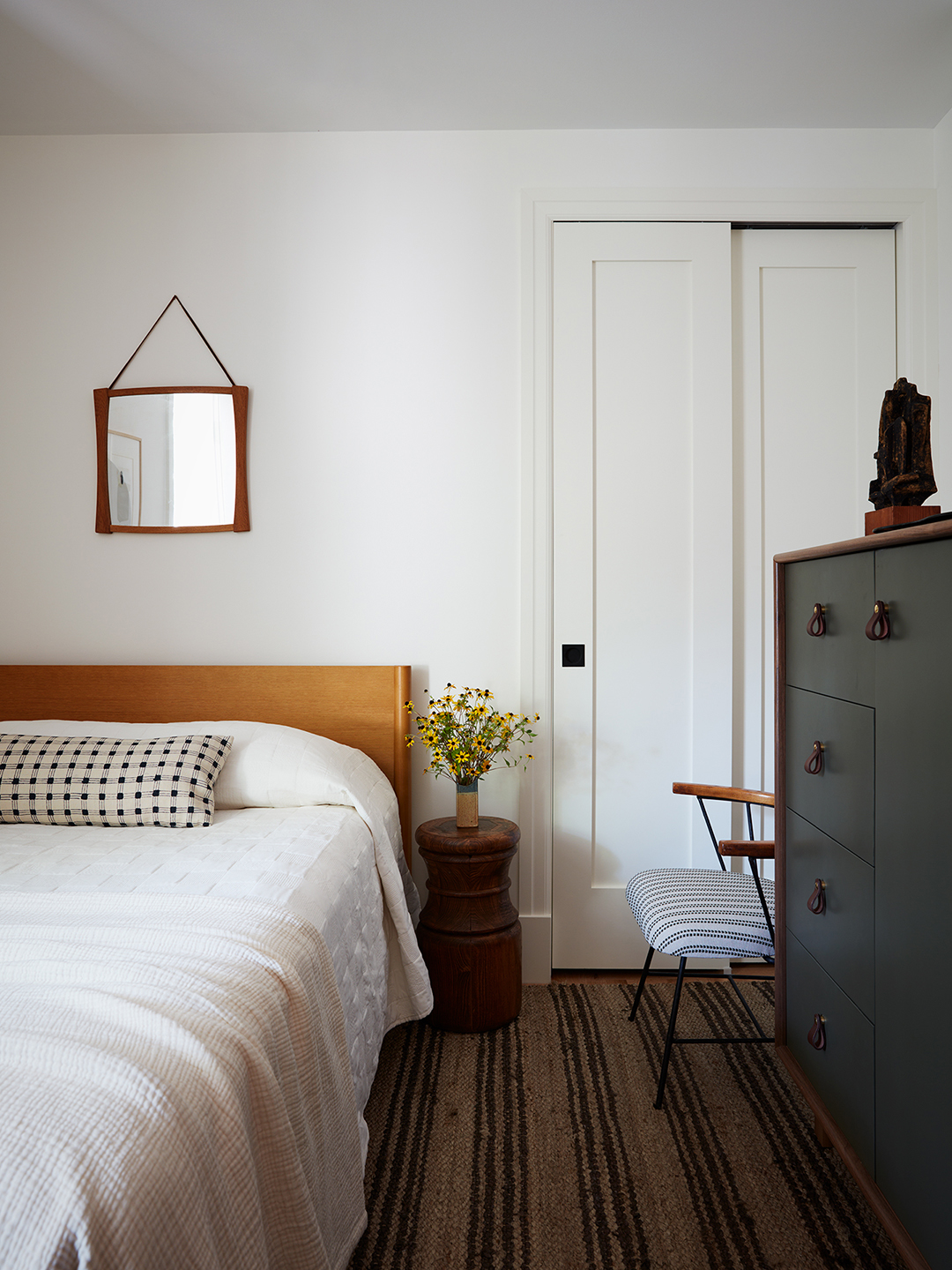 bedroom with yellow headboard